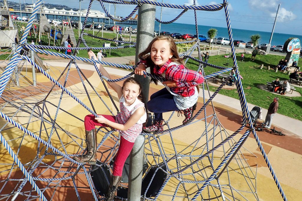 Children playing on climbing frame at Geoplay Park