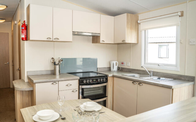 Comfort Caravan Dining Room and Kitchen at Beverley Holidays