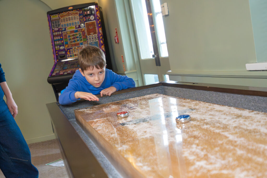 Playing Shuffleboard at Saltwater Kitchen, Terrace & Bar