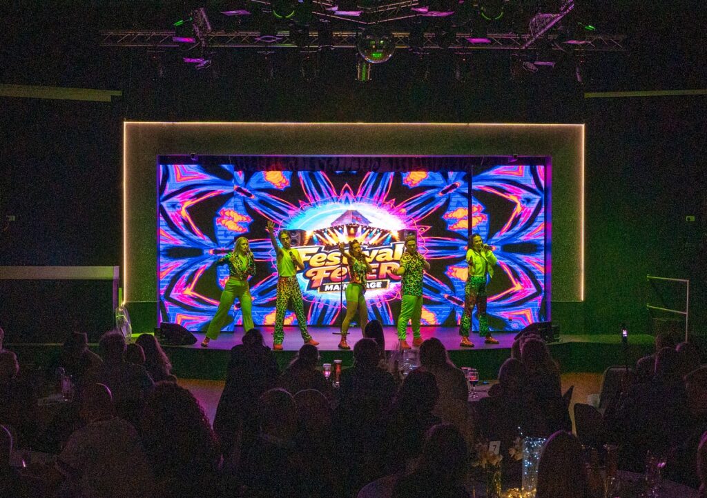 Starlight Stars entertainment on stage in the Starlight Bar. Festival Fever