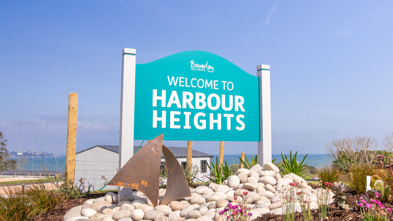 Harbour Heights Entrance Sign with sea view