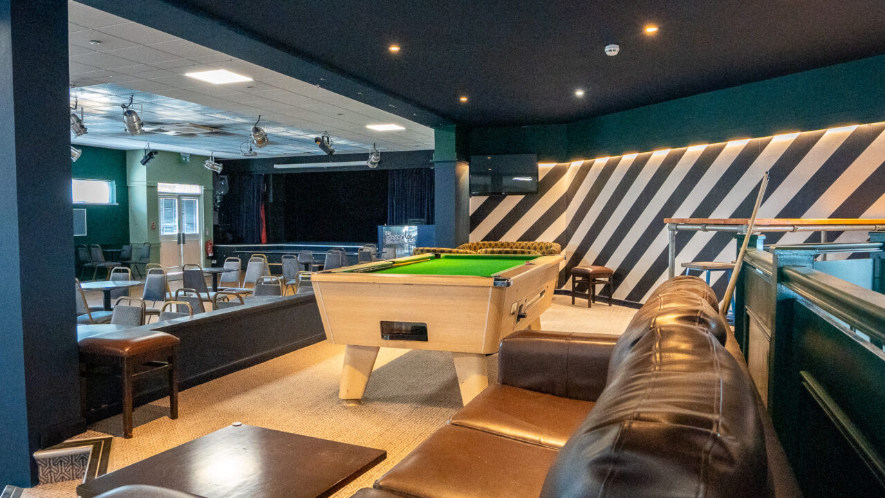 Play pool in Saltwater Kitchen, Terrace & Bar